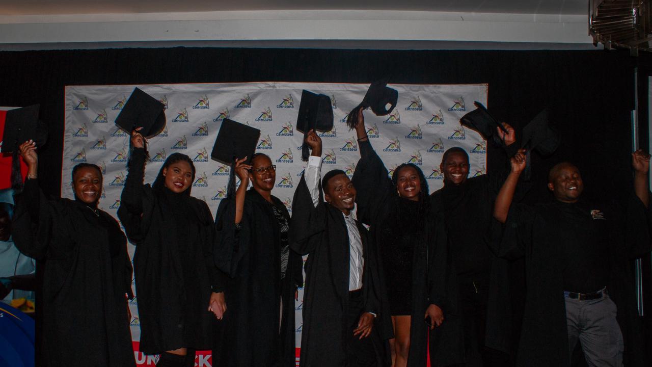 Graduates celebrating.