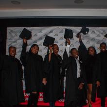 Graduates celebrating.